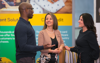 FIN-1 two women and man conversating