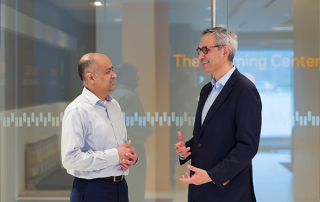 FIN-2 two men conversating in hallway