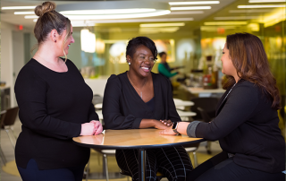 three women at a table